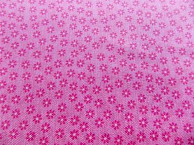 Tissu Petites fleurs sur fond rose