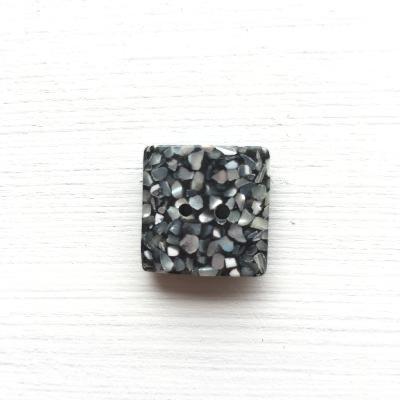 Buttons with recycled material