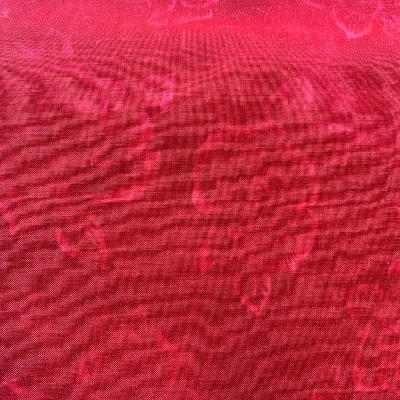 Tissu roses rouges fondues
