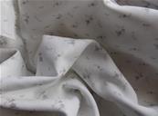 Tissu double gaze blanche fleurs argent