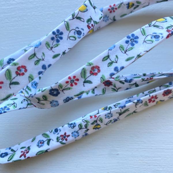 Biais replié fleurette fond blanc
