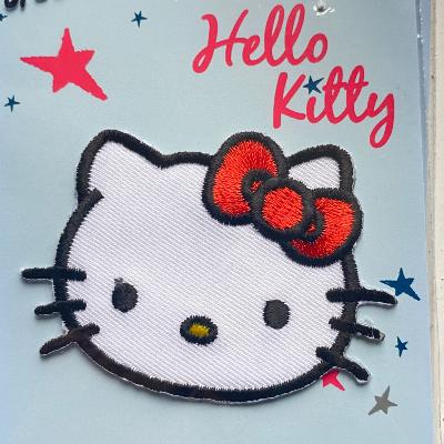 Hello Kitty iron-on patch with red ribbon