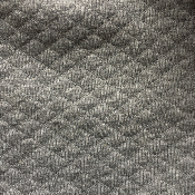 Tissu matelassé gris moyen