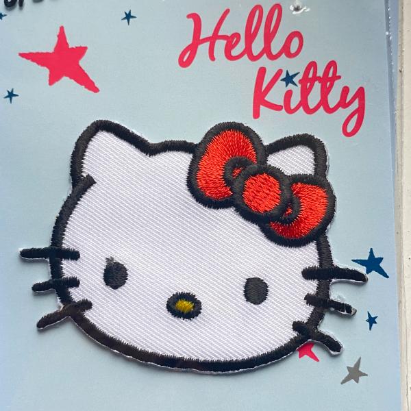 Motif thermocollant Hello Kitty avec noeud rouge