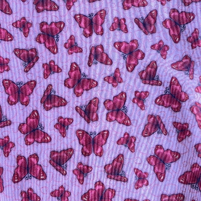 Tissu papillons rouges sur fond rose