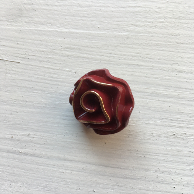 Bouton rose métallique