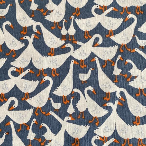 Geese fabric on a blue background