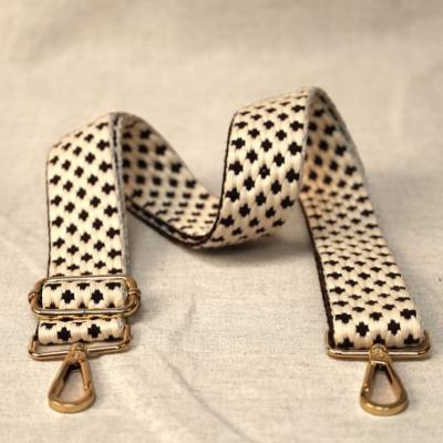 Bandouli�re tiss�e �crue motifs noirs