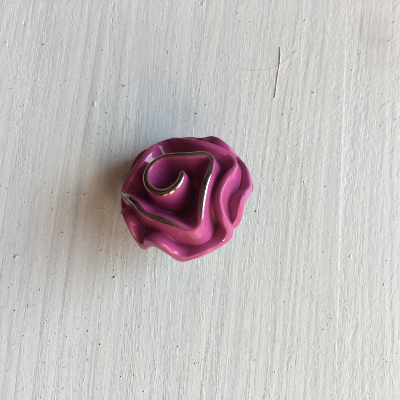 Bouton rose métallique