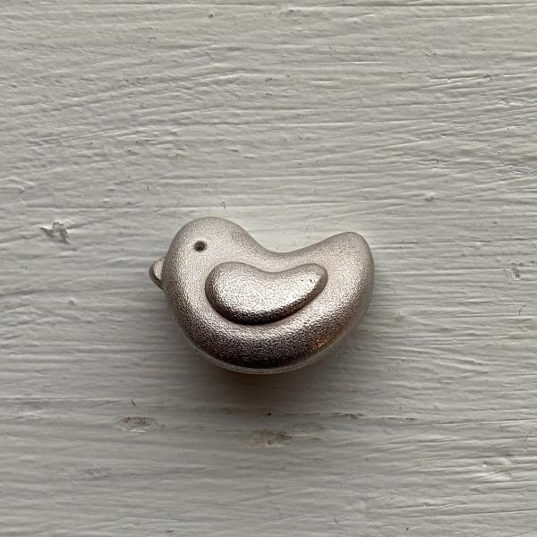 Bouton acrylique imitation acier